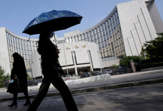 传陆央行指导国有大行"少买美元"应对川普关税战
