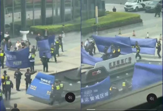 抓烂尾楼抗争民众 警察出动大量布条遮挡 网热议