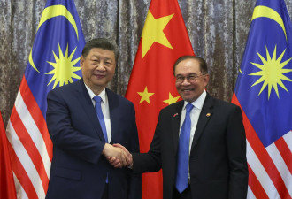 习近平访问马来 发表“命运共同体”联合声明
