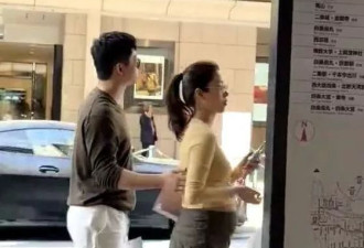 杨采钰孕肚曝光像五六个月，与戴婚戒男子亲密同行
