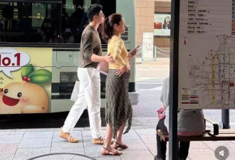 杨采钰孕肚曝光像五六个月，与戴婚戒男子亲密同行