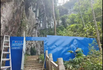 "世界第一长洞"钟乳石遭刻字,溶洞入口被围挡封住