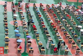 职校学生户外冒雨考试引质疑，学校：系考试中途下雨