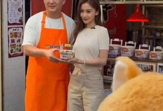 Angelababy澳门被偶遇，卖力为街边小吃拍广告，皱纹明显脸浮肿