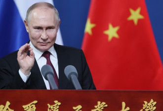 普京：我孙女能说一口流利的中文
