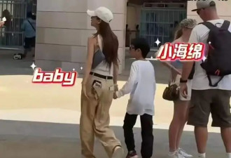 杨颖带儿子游玩，8岁小海绵走路姿势像黄晓明，身高到妈妈肩膀