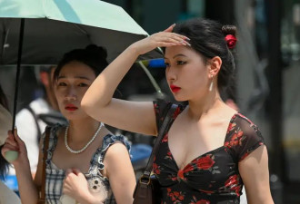 中国酷暑破40度 北京湿热像“被牛舔脸”