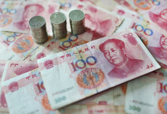 中国多地提升最低工资 缓解强制社保怨气？