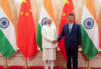 莫迪向习近平示好 习近平呼应实现“龙象共舞”