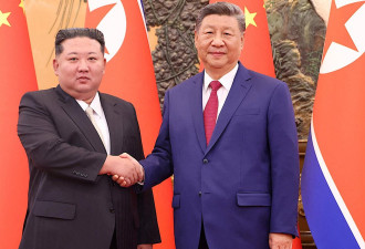 习近平在北京同金正恩会谈 韩媒指会面持续约1小时