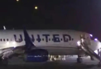 美联航波音737客机迫降日本关西机场 乘客紧急疏散