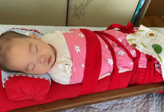 为什么内蒙古的婴儿会被绑起来