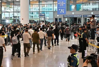 韩国工程师回忆美国被捕 "我们被铐, 还被枪指着"