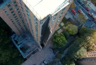 纽约20层大楼劈开一道：疑烟囱瓦斯爆炸 满地碎磁砖