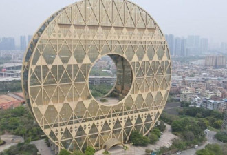 被评为"最丑建筑" 广州铜钱大厦挂拍15天无报名