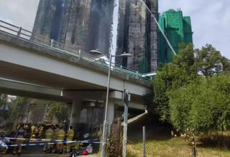 香港火灾中逃出来的不少人两手空空 家当只剩手机