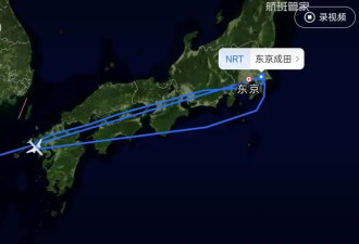 东京飞上海航班紧急返航，机上一男子被警察带走