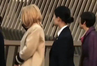 中国最美女保镖保护马克龙夫人 眼神犀利如飞刀引关注