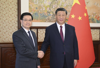 李家超将向习近平报告香港大火状况