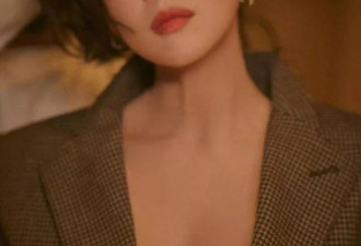 章子怡亮相澳门电影节红毯，穿格纹西服装风情万种