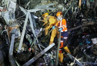 菲律宾垃圾场塌陷事故已致36人死亡....