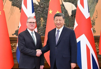 习近平见英国首相时 引用毛泽东诗词