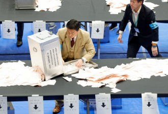 日本大选自民党大胜 有望取得318席