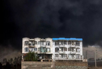 “战争进入喉咙”，黑雨吞没伊朗首都