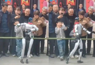 中国机器人表演到一半 突甩男童一巴掌继续跳