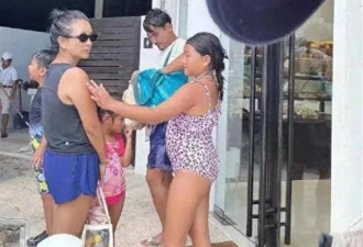 何洁泰国度假,38岁的她满头白发,两女儿颜值身高差太大