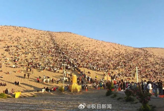 敦煌鸣沙山骆驼五一全员加班，队伍绵延数里