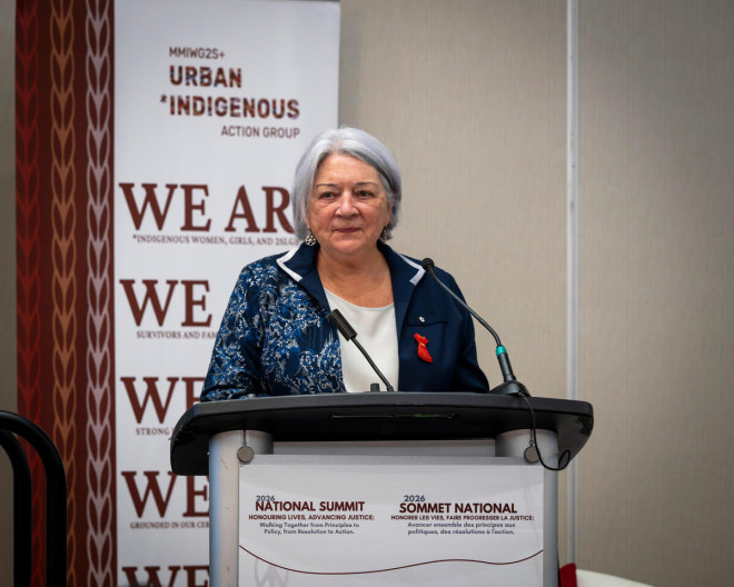 Governor General Mary Simon standing at a podium.