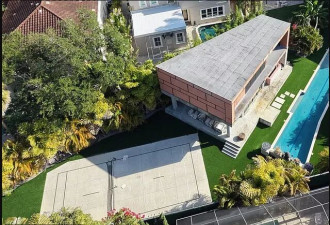 砸百万建豪华后院 被邻居告进监狱 美富人区邻里大战升级