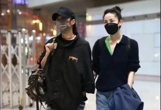 56岁王菲与中年男子亲密合照，搭肩又搂腰...