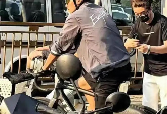 谢霆锋北京街头骑行等红灯被偶遇 侧颜帅炸了 这状态哪像44岁！