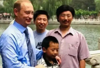 普京在人民大会堂再见26年前抱过的中国男孩