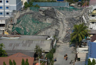 菲兴建中饭店暴雨后突然倒塌：已致4死17失踪