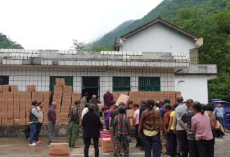 女村支书耳环风波背后：一个暴雨重灾区的“幸运村”