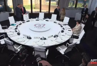 高市早苗在G7峰会会场“转椅子”画面引争议