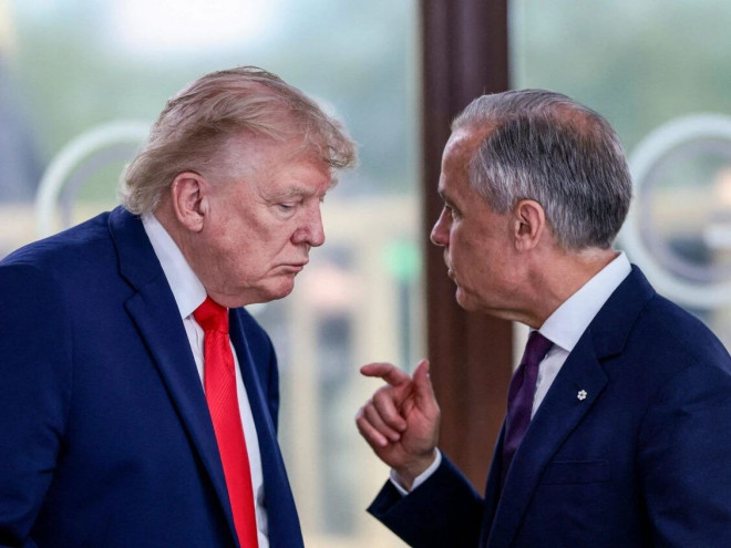 特朗普与加拿大总理卡尼于 2026 年 6 月 16 日法国 G7 峰会午餐会谈。