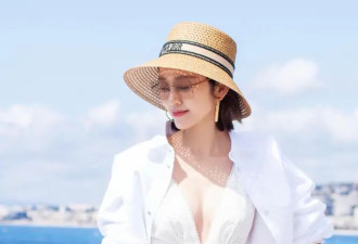被称为"大号水蜜桃"的唐艺昕，晒海边游玩美照，气质明艳动人