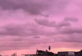 惊艳刷屏!台风巴威登陆前 杭州天空变成紫色、粉色