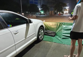 广西暴雨 孤岛小区500业主死守3昼夜 保住千辆车