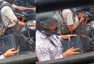 社畜悲歌？塞车等红灯 打开电脑原地上班 辛酸画面全网疯传
